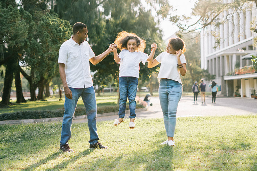 family playing on lawn